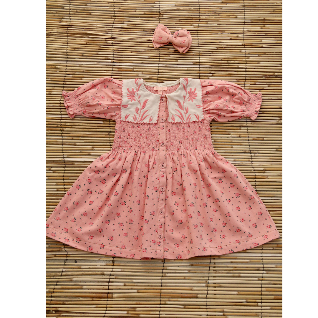 Robe rosa bloom avec barette