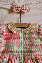 Tunique tapisserie rose et sa barrette assortie