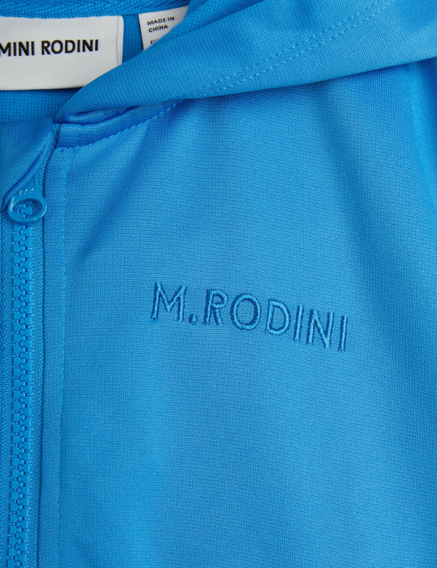 Blue zipped vest with yellow band