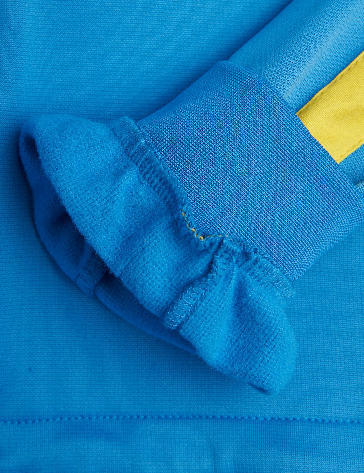 Blue zipped vest with yellow band