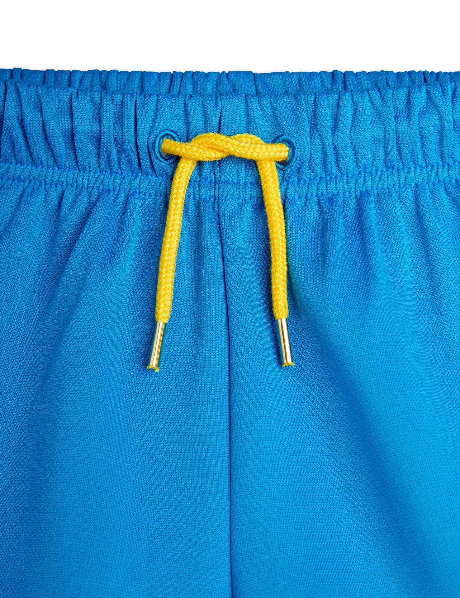 Blue shorts with yellow strip