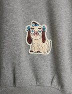 Grey sweatshirt with dog patches