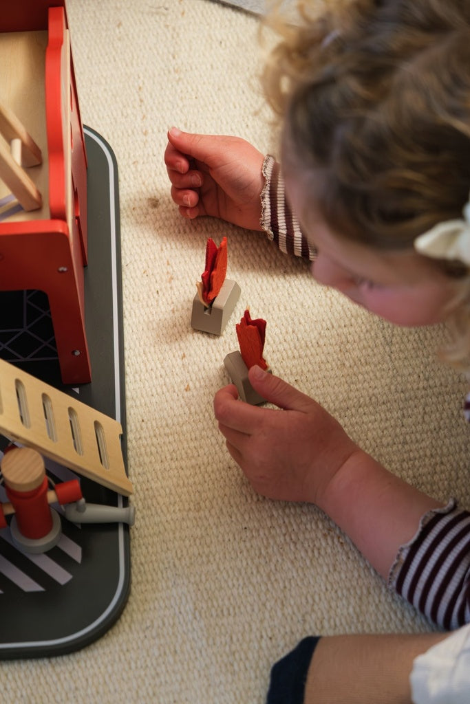 Large fire station with miniature friend