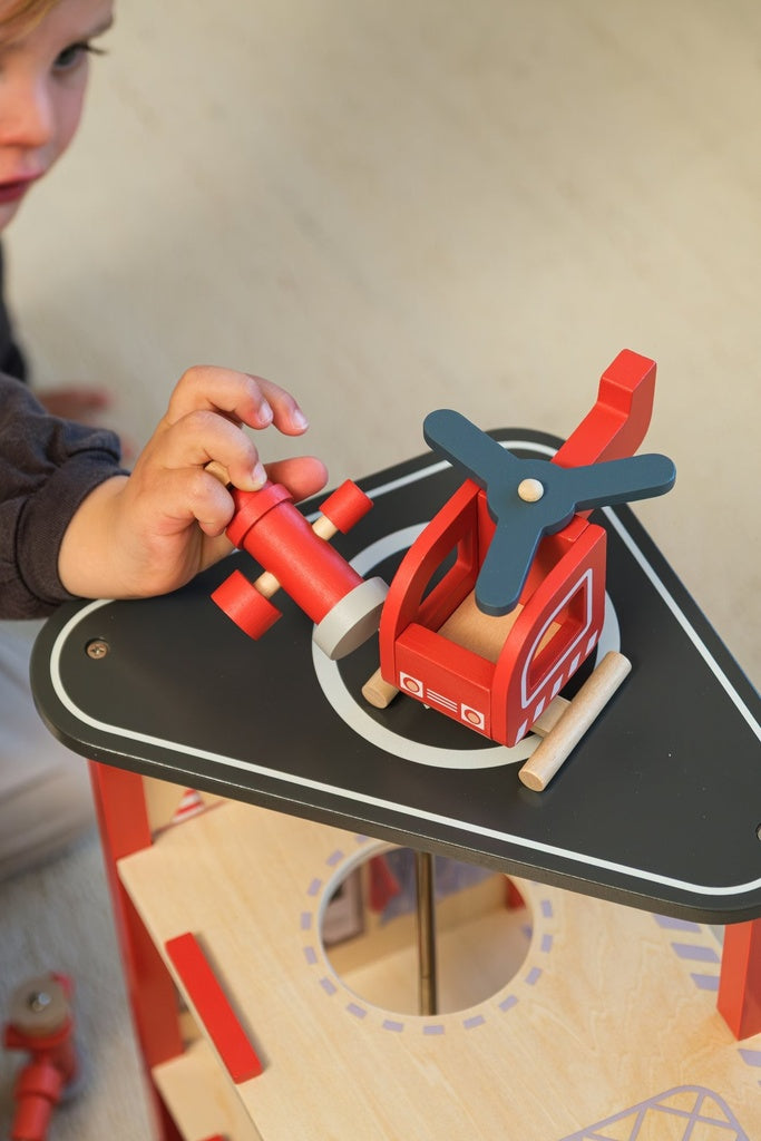 Large fire station with miniature friend