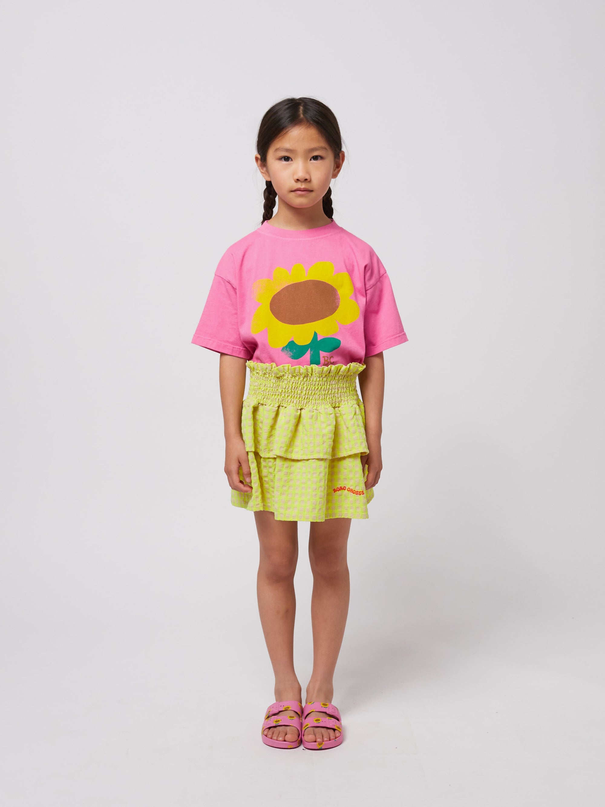Short skirt with yellow tiles with ruffles