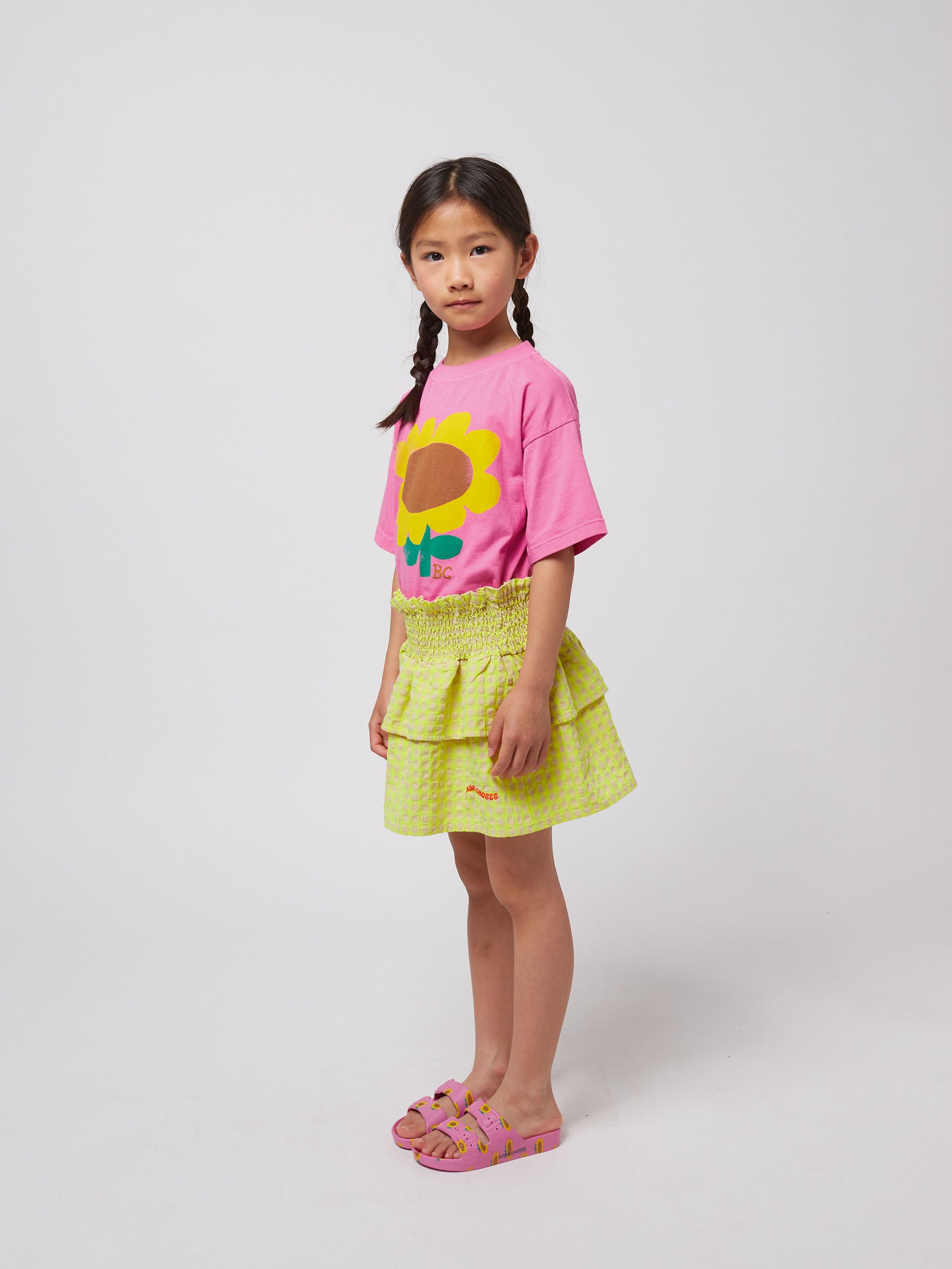 Short skirt with yellow tiles with ruffles