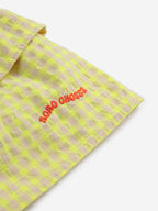 Short skirt with yellow tiles with ruffles