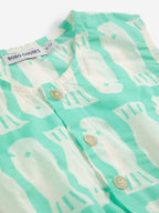 Turquoise dress with printed fish