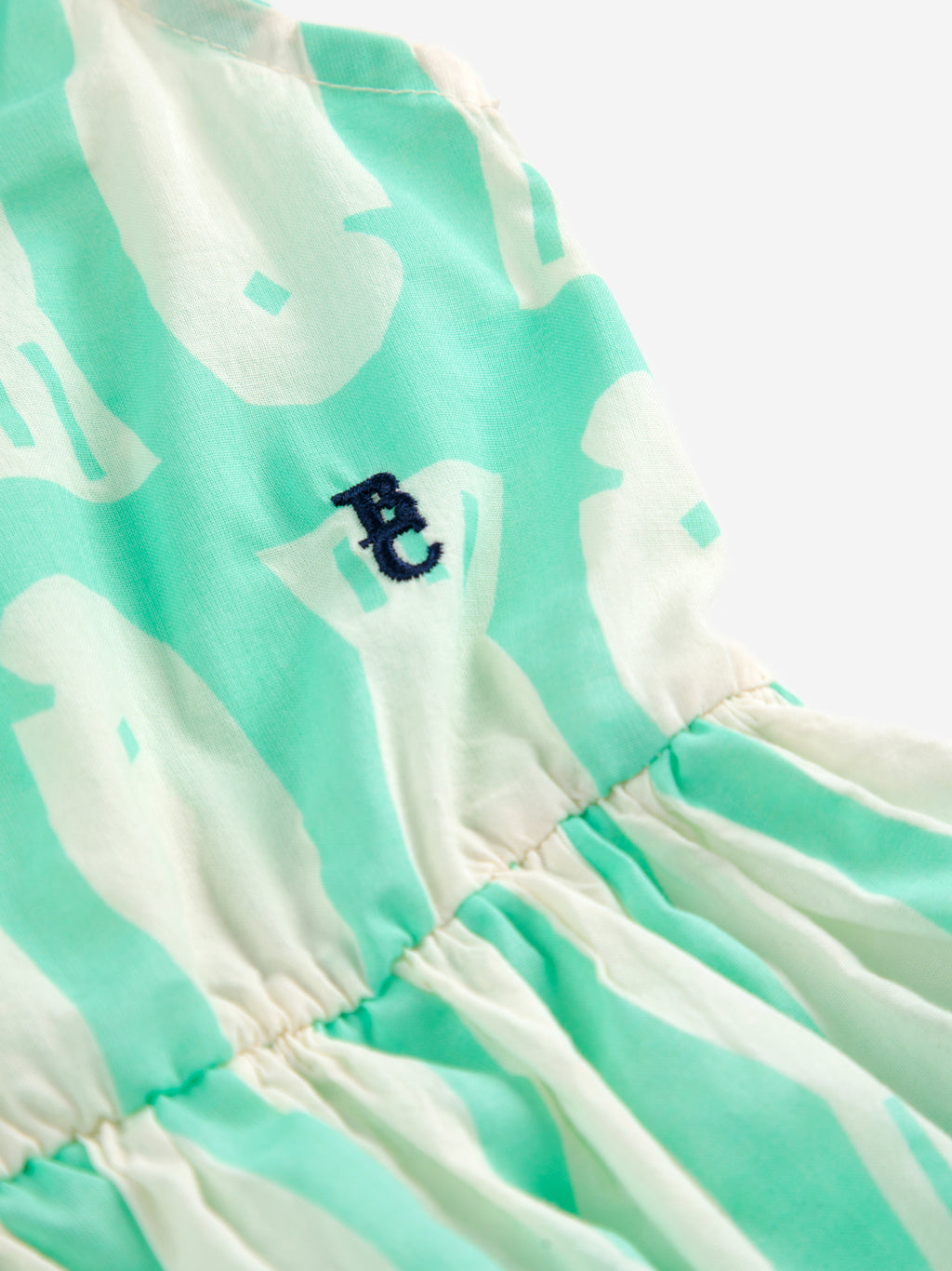 Turquoise dress with printed fish