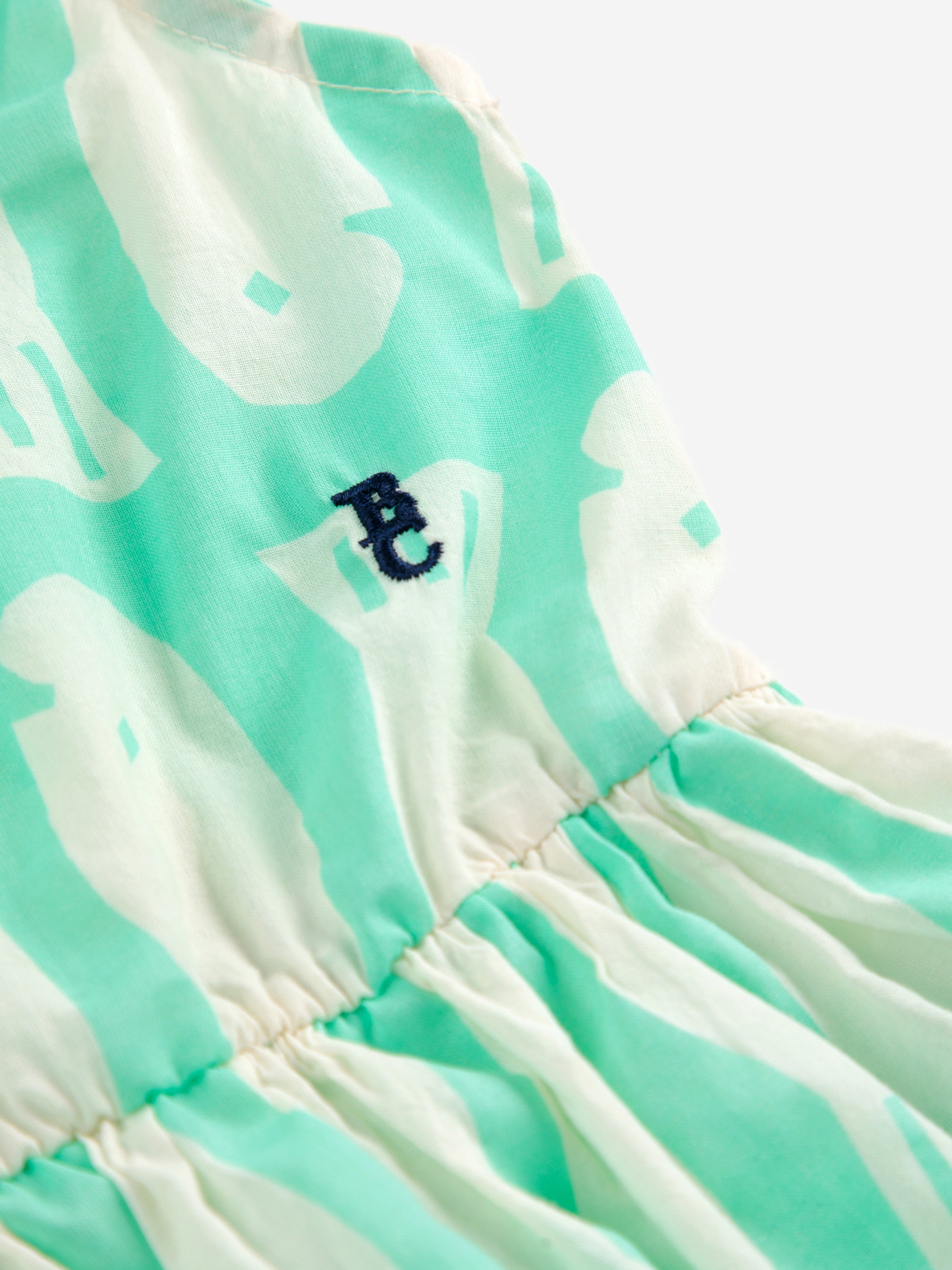 Turquoise dress with printed fish