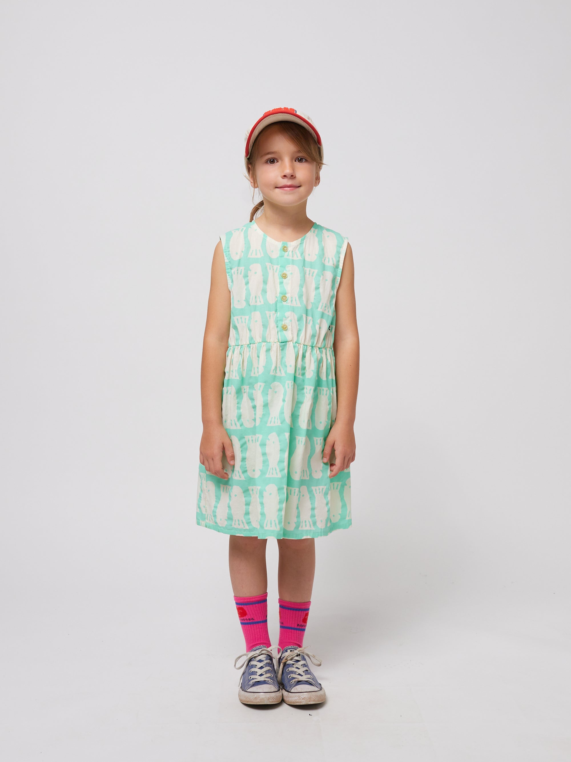 Turquoise dress with printed fish