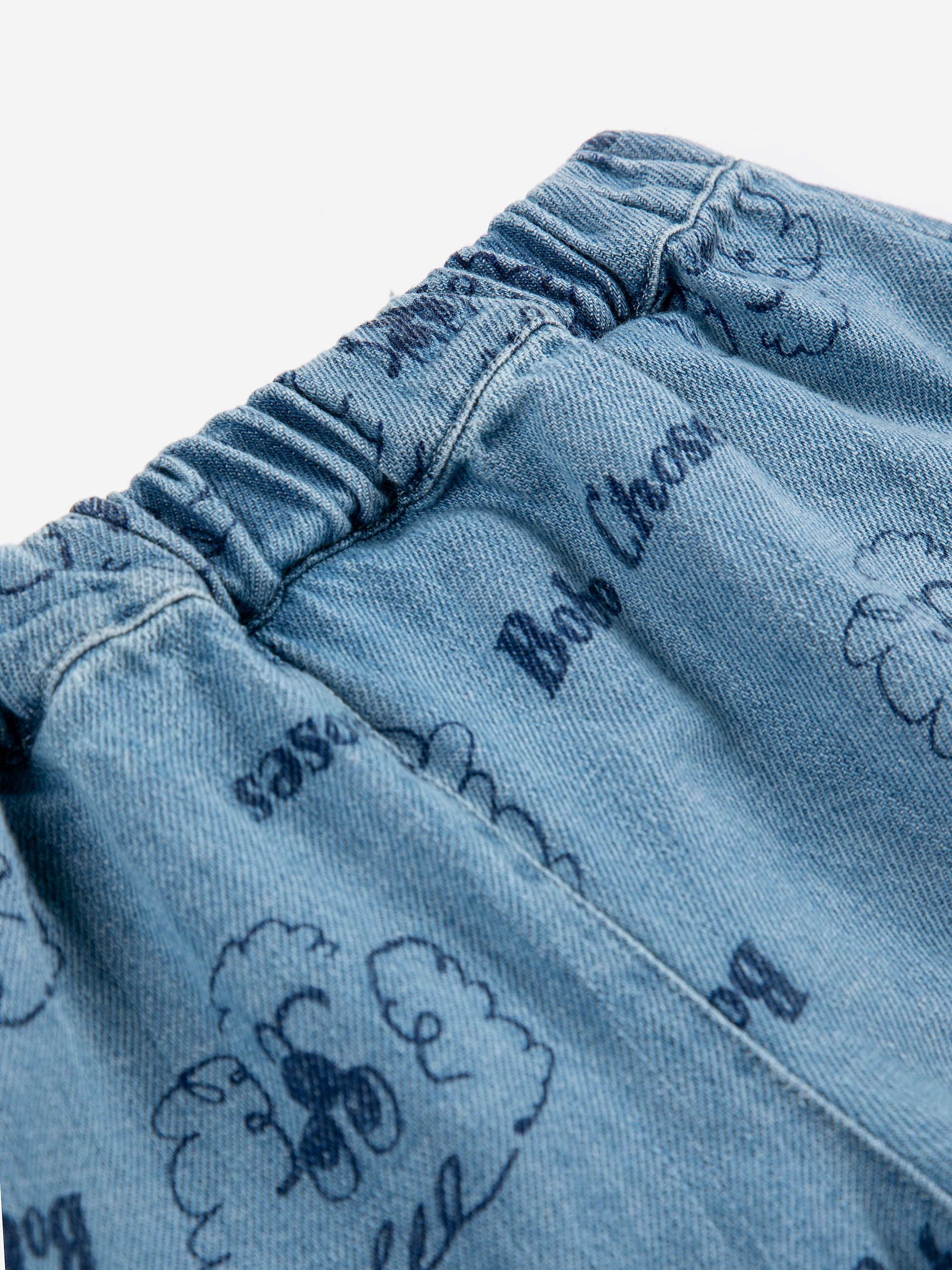 Baby Blue Denim Trousers with All Over “Pickles the Dog” Print