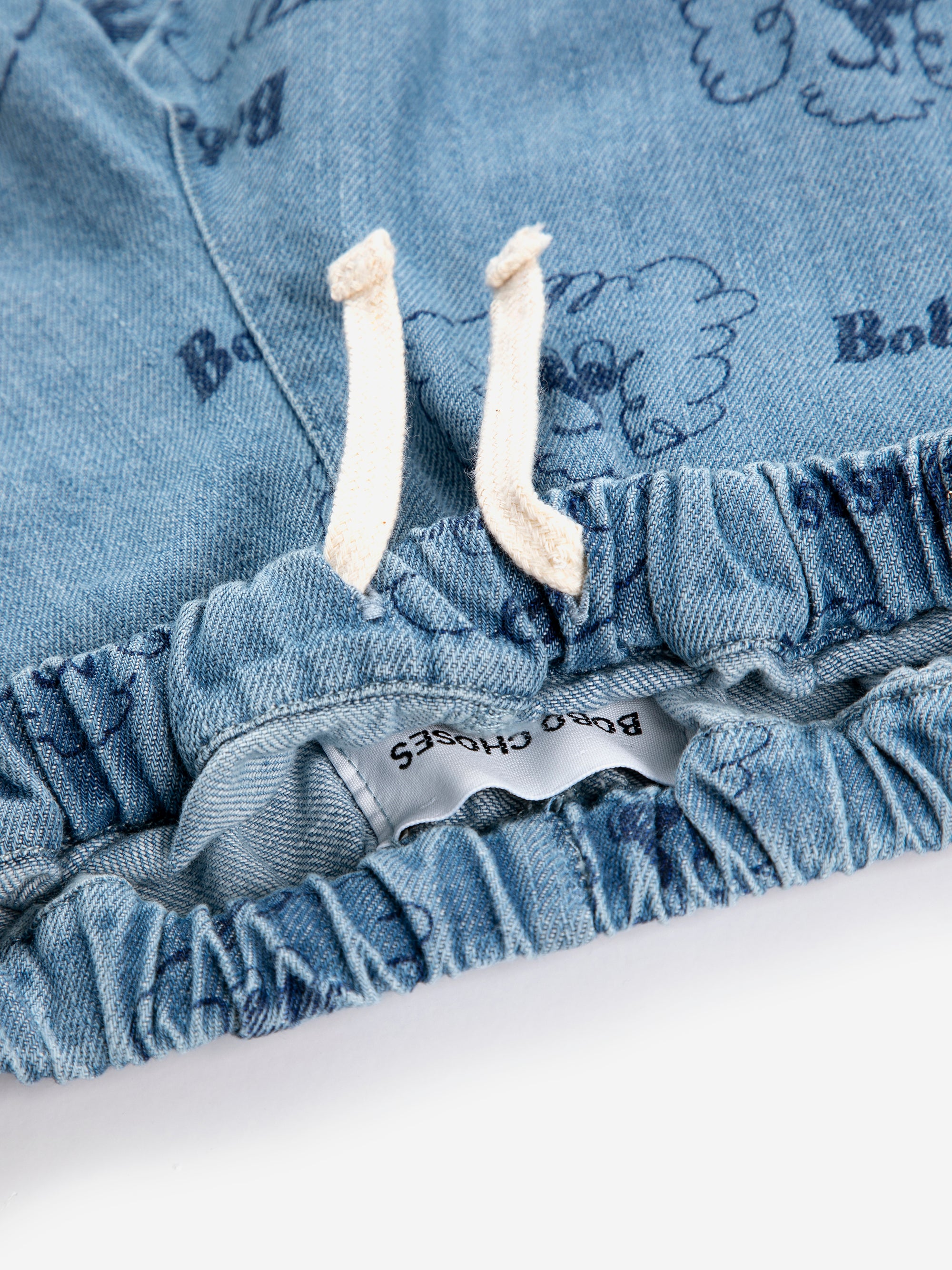 Baby Blue Denim Trousers with All Over “Pickles the Dog” Print