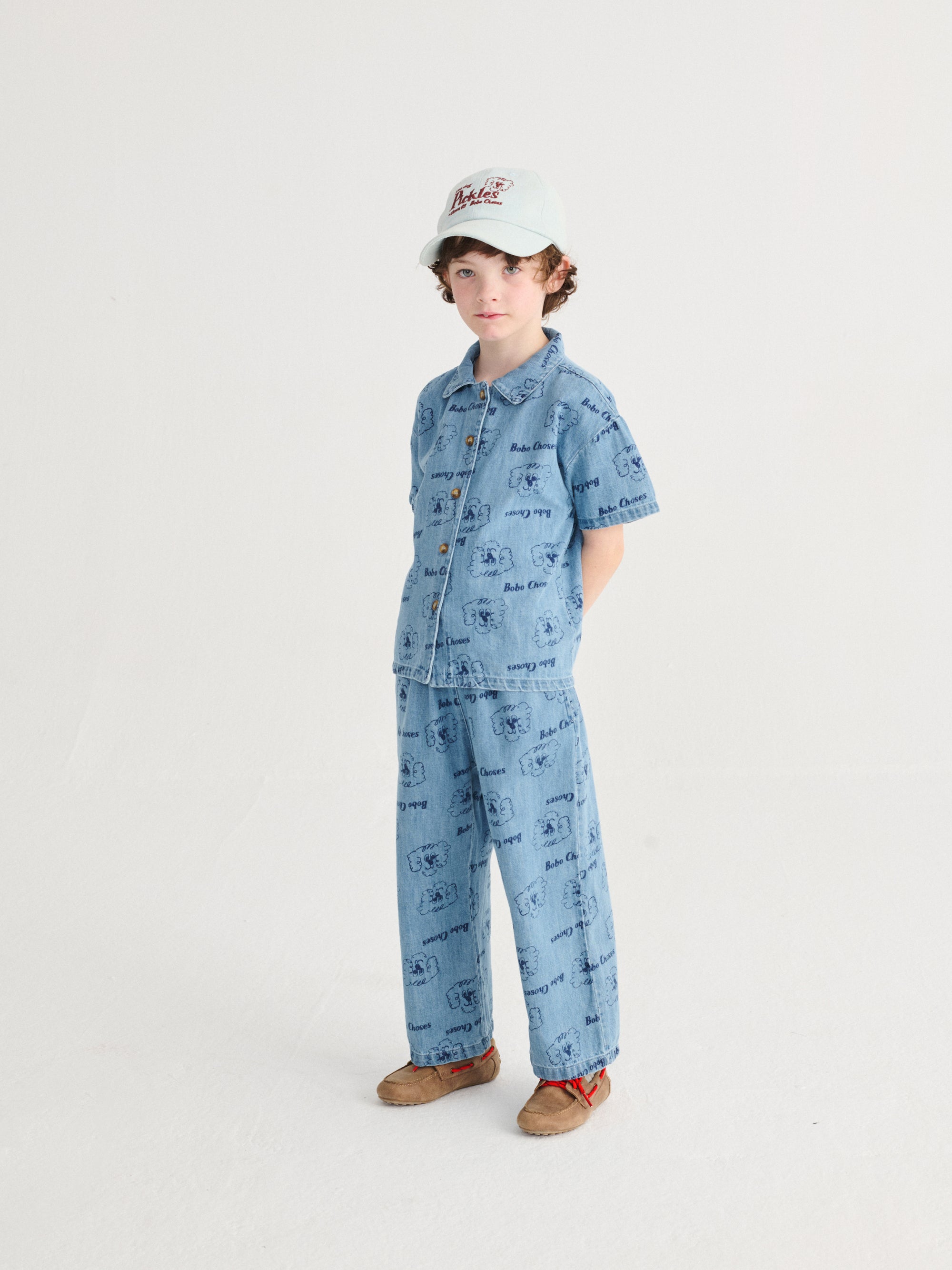 Light Blue Denim Trousers with All Over “Pickles the Dog” Print