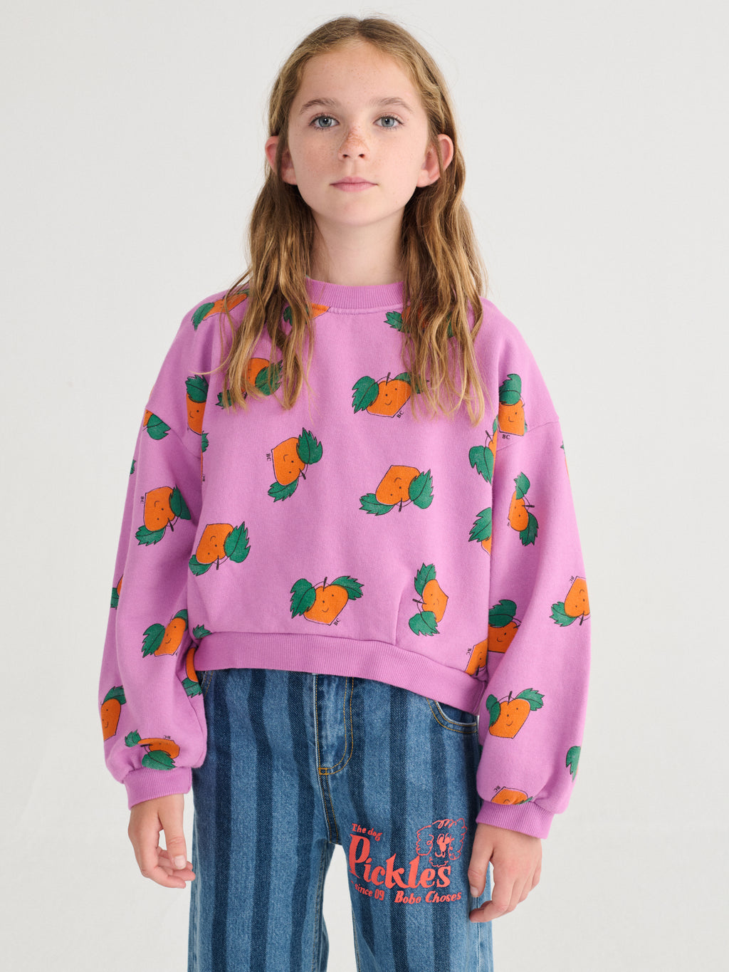 Purple Cropped Sweatshirt with All Over Orange Print