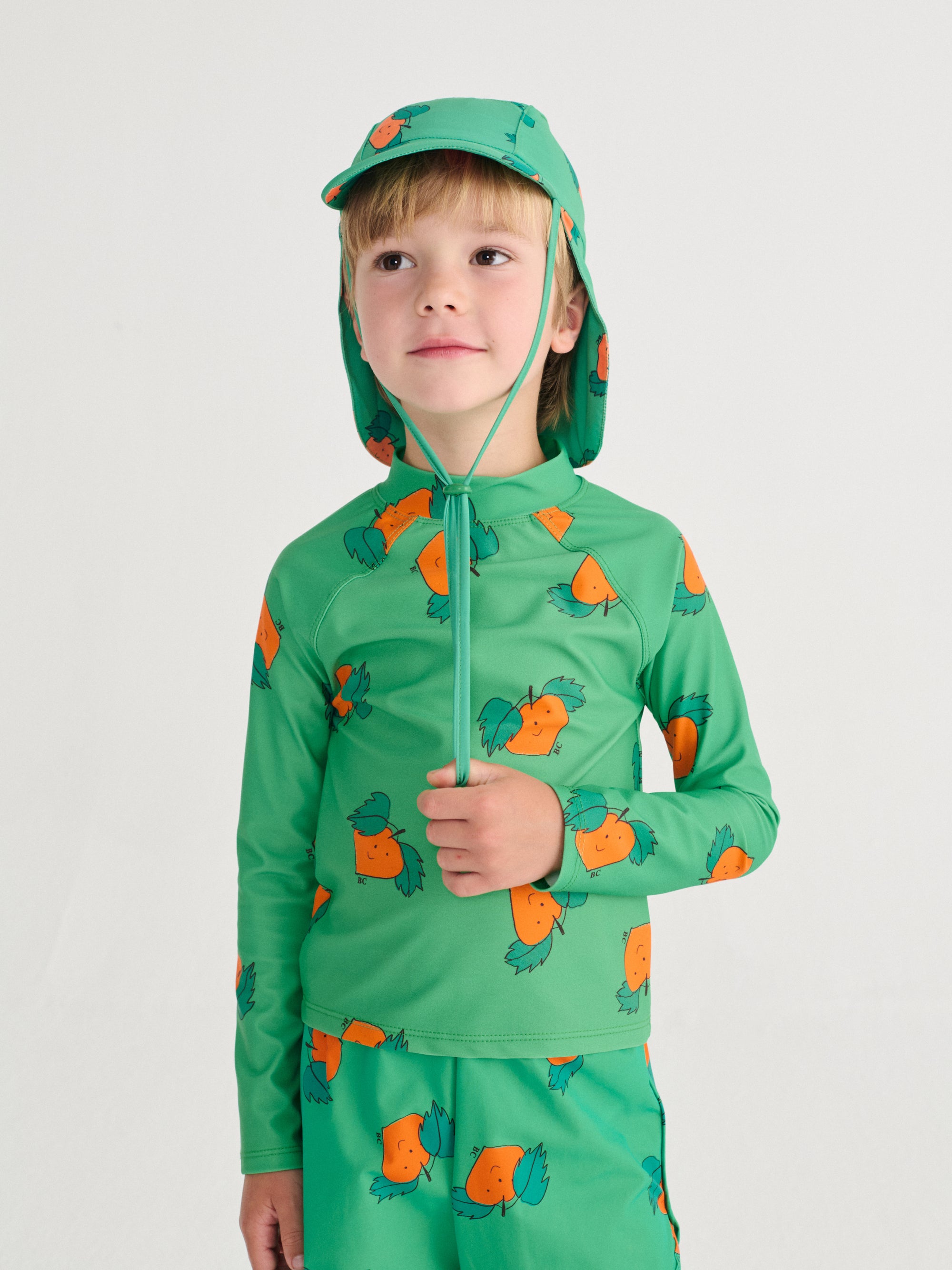 Green Swim Trunks with Curious Turnip All Over Print