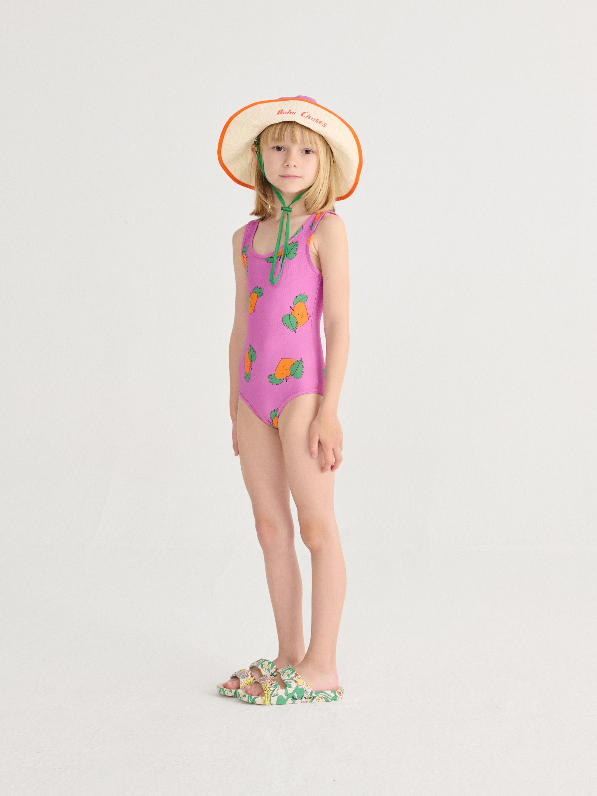 Purple One-Piece Swimsuit with All Over Orange Print