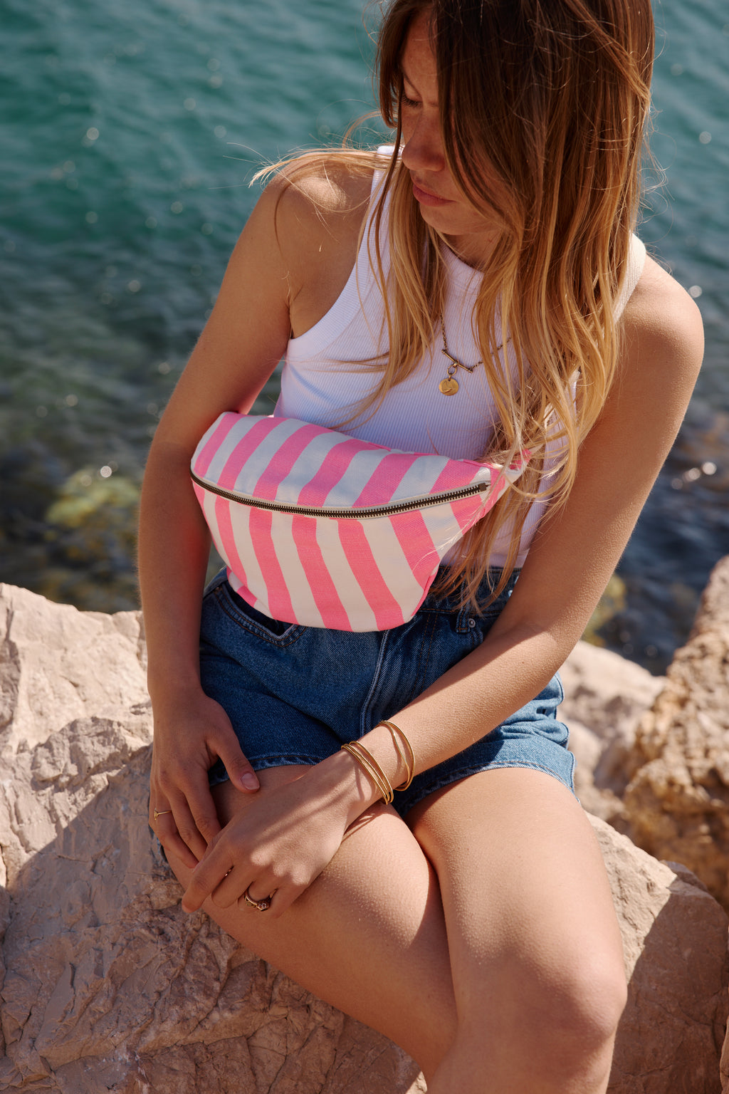 Neon pink striped fanny pack