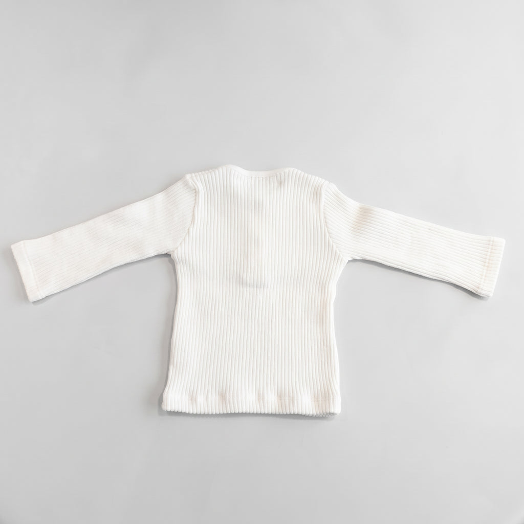 Pull bébé en maille coloris blanc