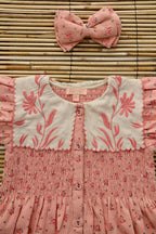 Robe rosa bloom avec barette