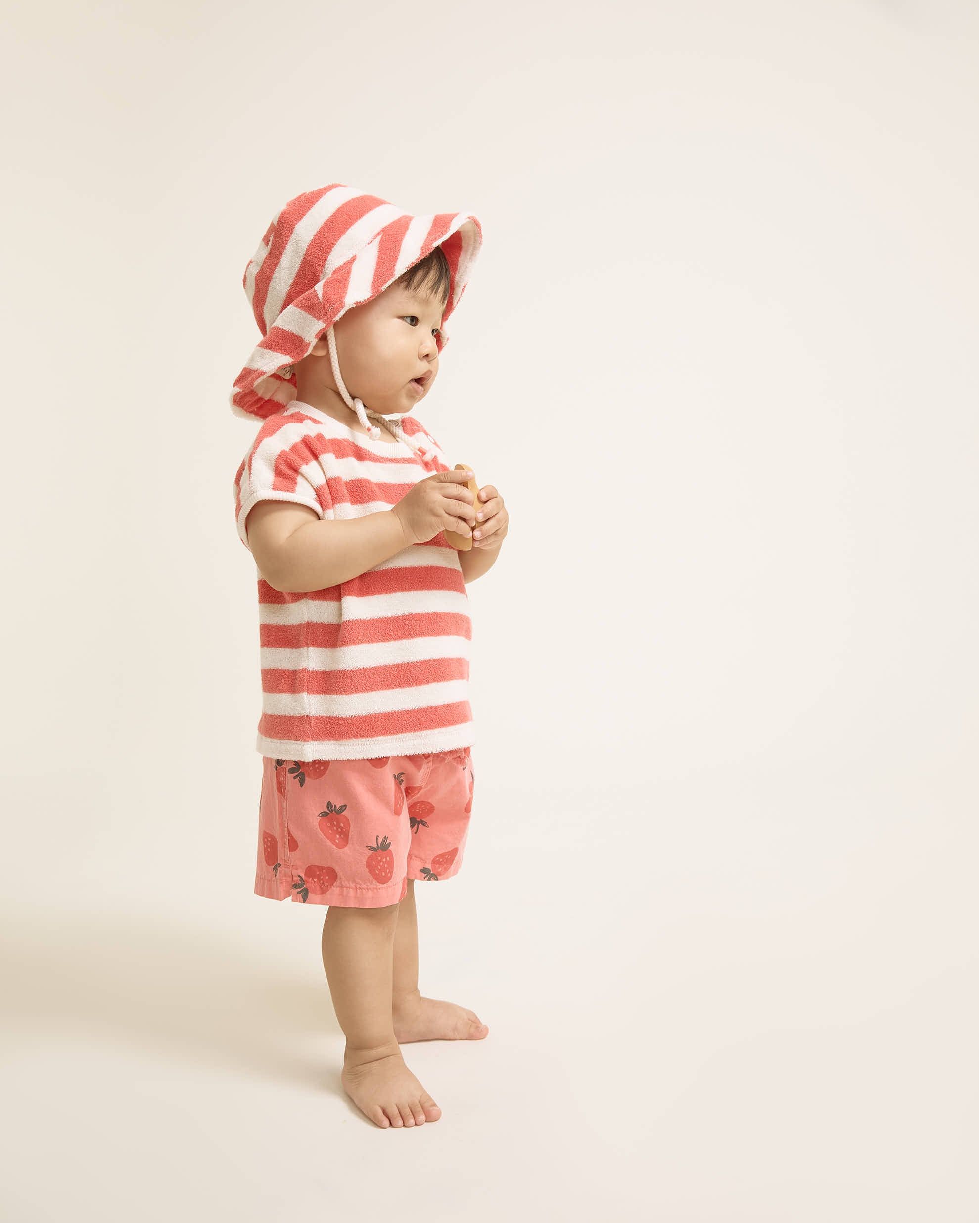 Soft Coral Baby Swim Shorts with Strawberry Pattern