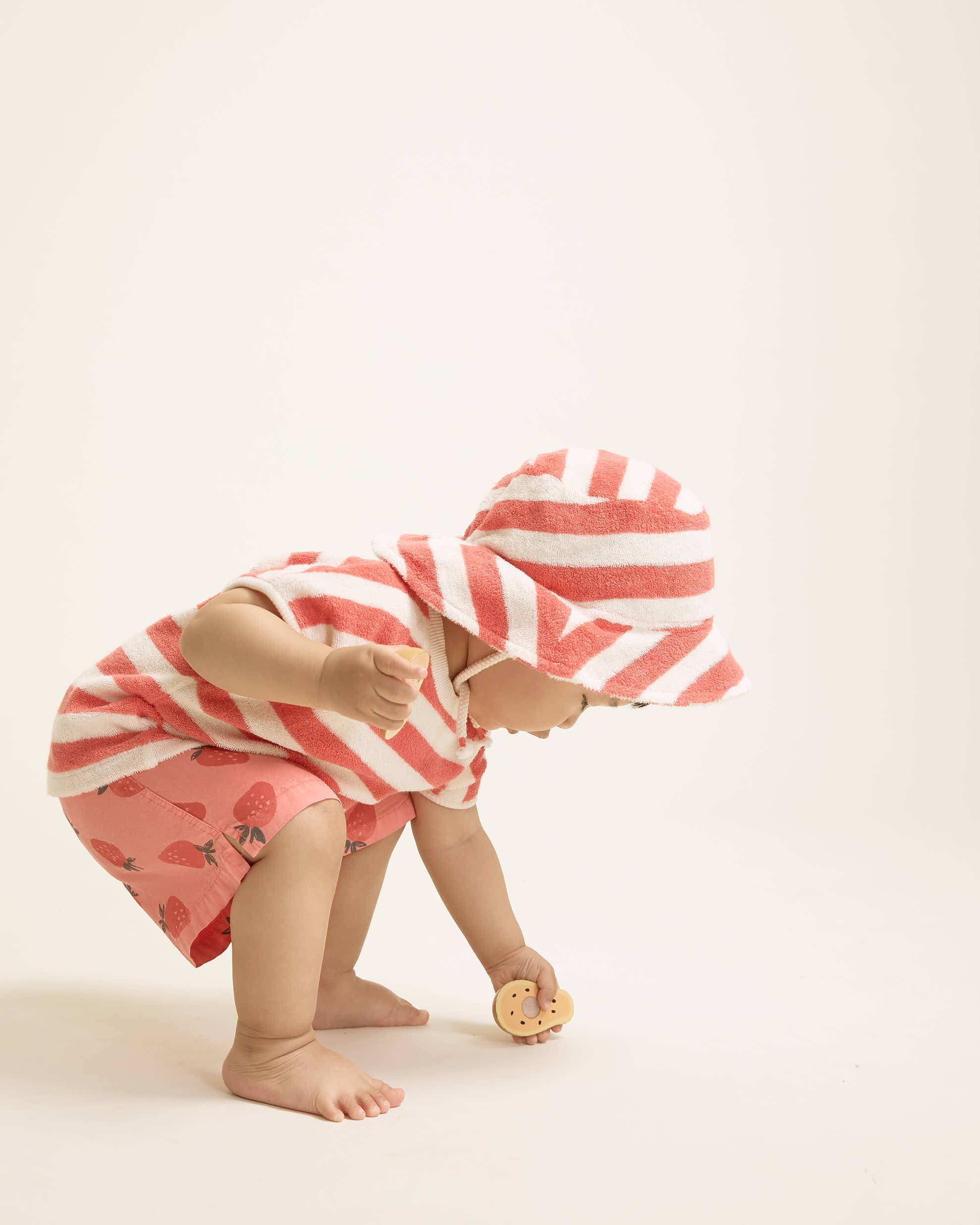 Soft Coral Baby Swim Shorts with Strawberry Pattern