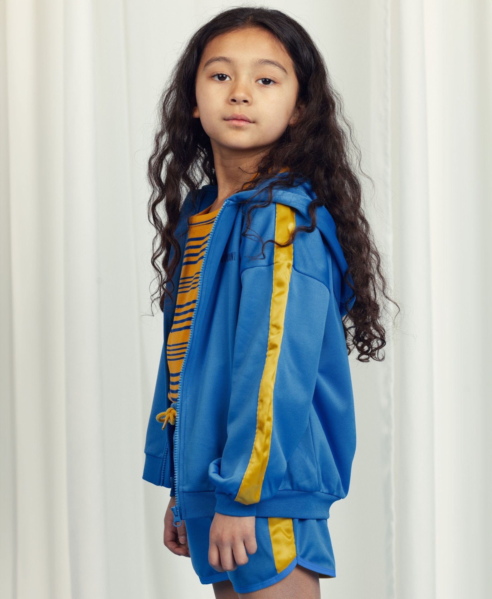 Blue zipped vest with yellow band