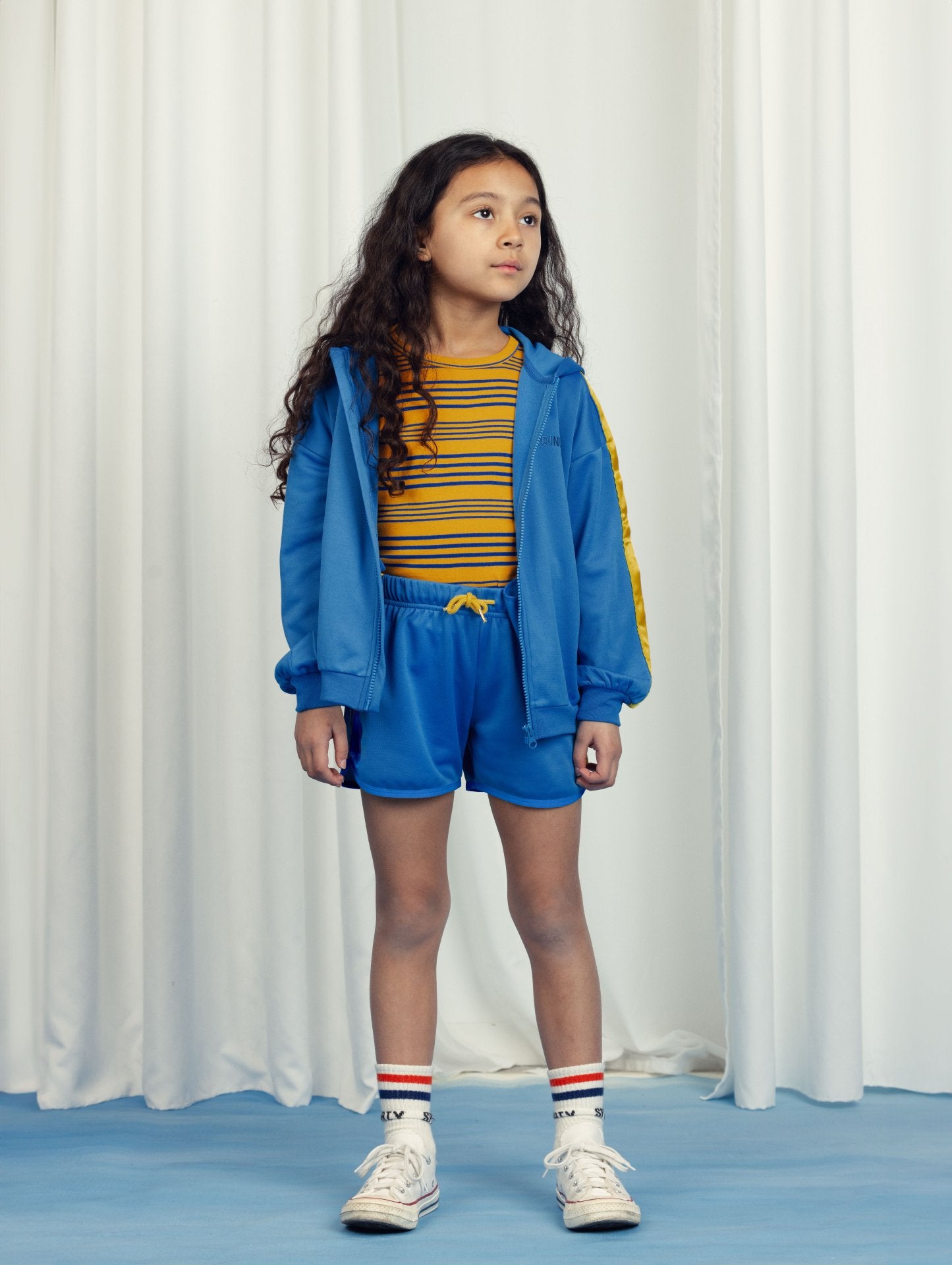 Blue shorts with yellow strip