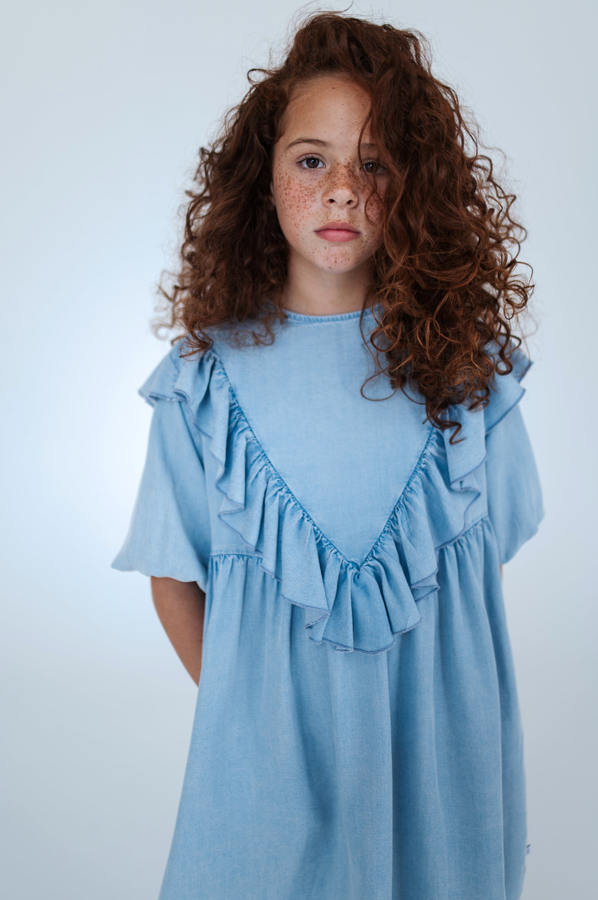 Sky blue denim dress with ruffles