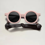 Lunettes de soleil (bébé) BabyMocs - Signature rond rose