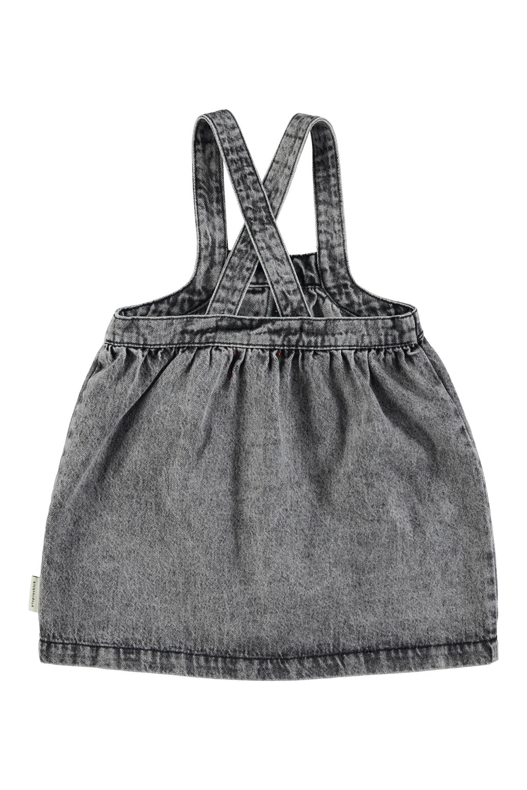Short dress with washed -down black denim suspenders