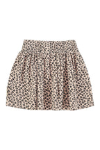 Short pale pink skirt with animal print