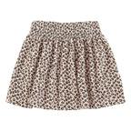 Short pale pink skirt with animal print