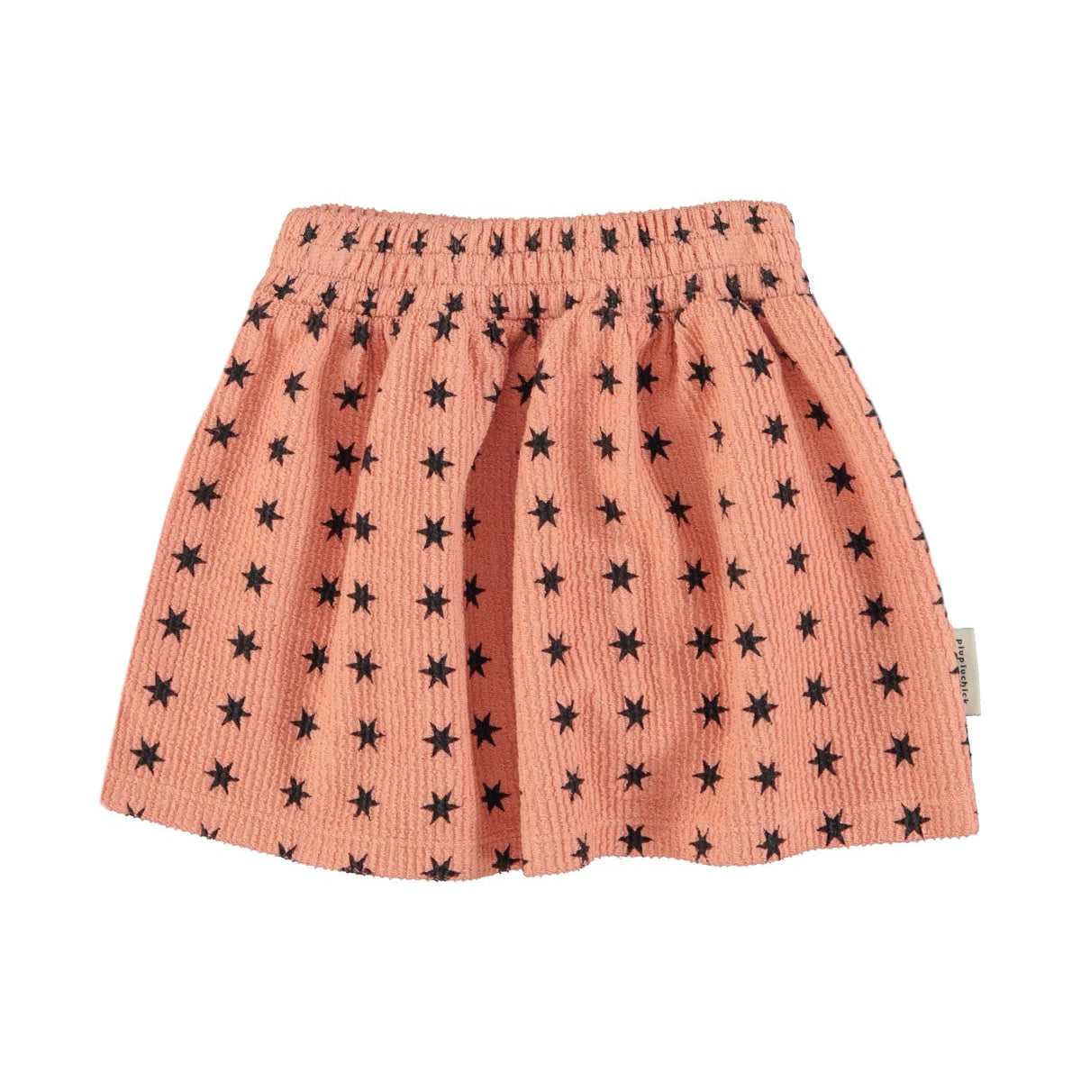 Short pink skirt with black stars