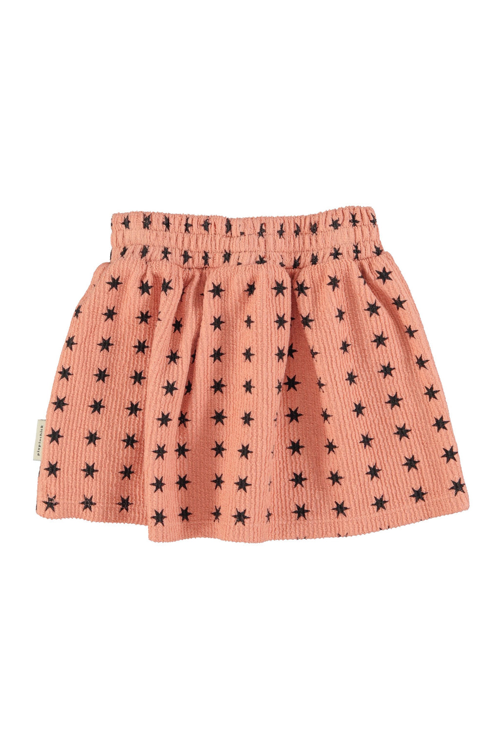 Jupe courte rose à étoiles noires