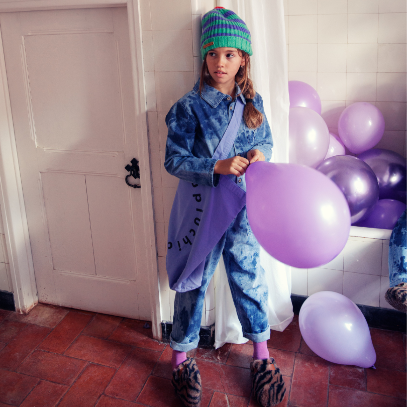 Knitted hat with pompon green & purple stripes