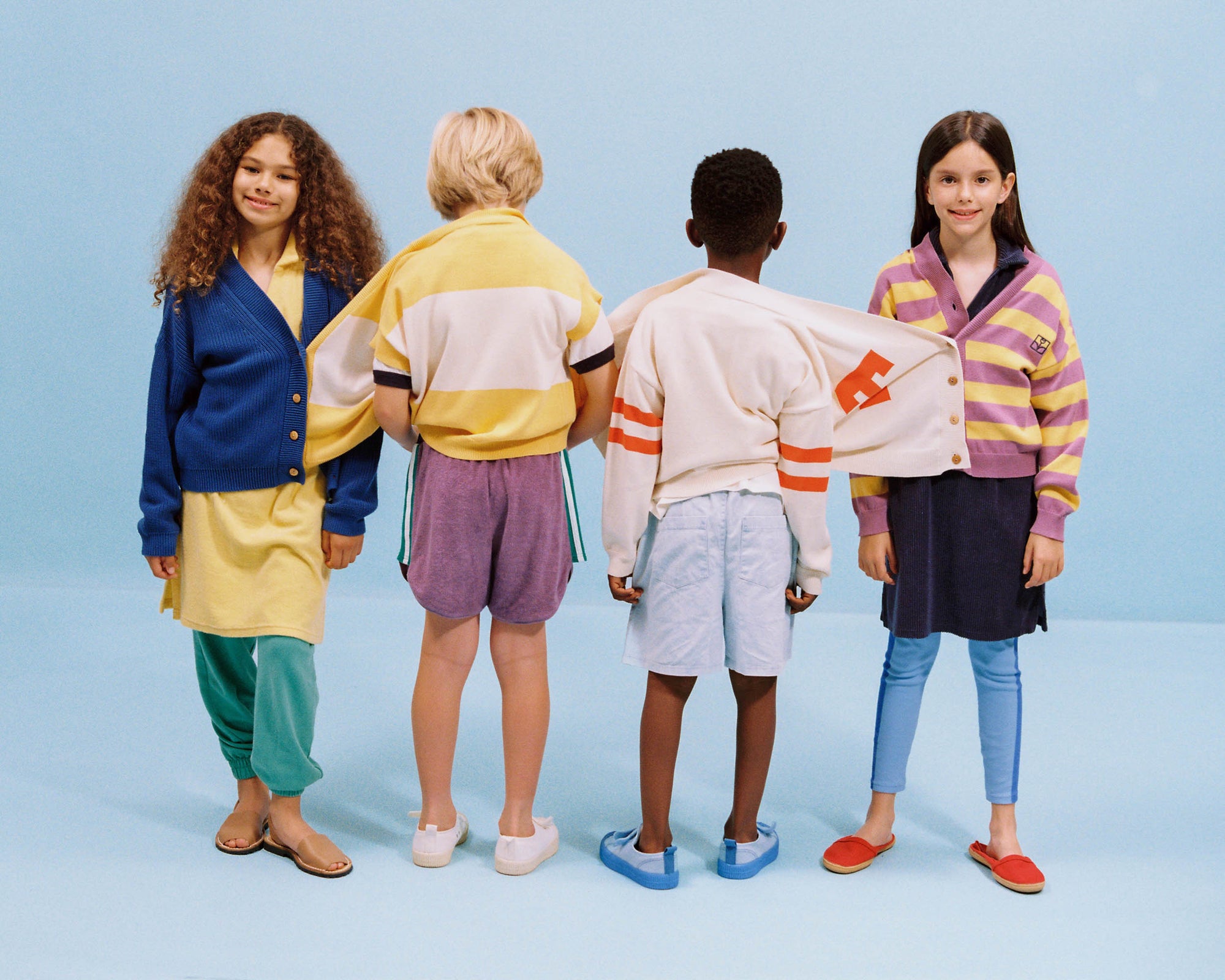 Purple children's shorts with colored edges