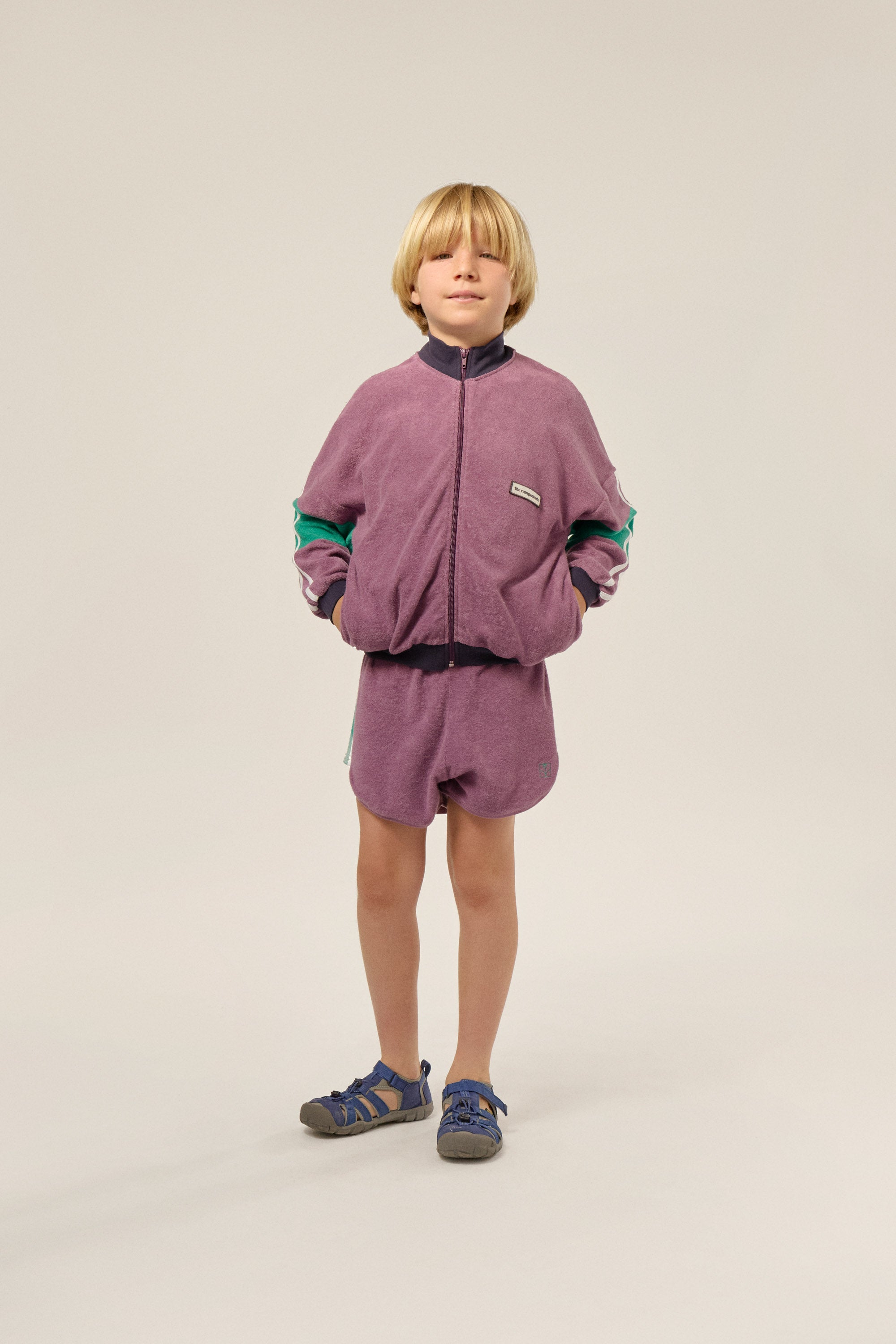 Purple children's shorts with colored edges
