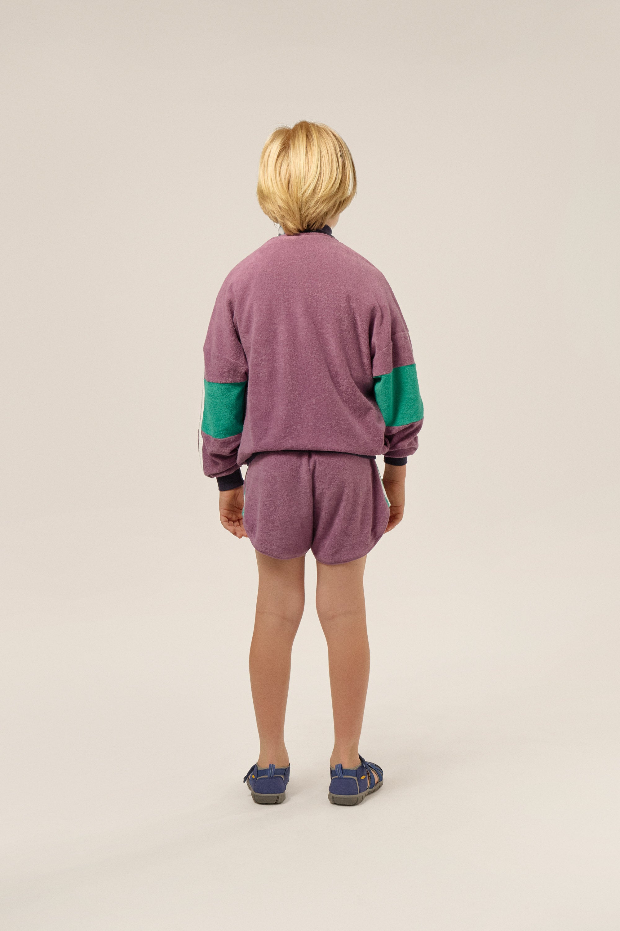 Purple children's shorts with colored edges