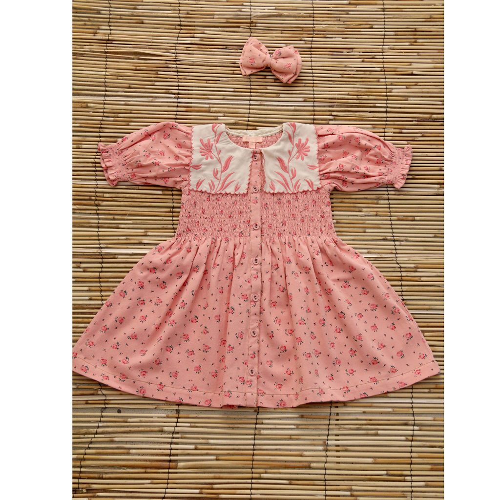 Robe rosa bloom avec barette