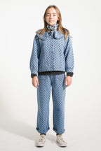 Flare pants in faded blue denim with black hearts