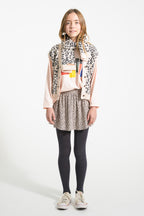 Short pale pink skirt with animal print