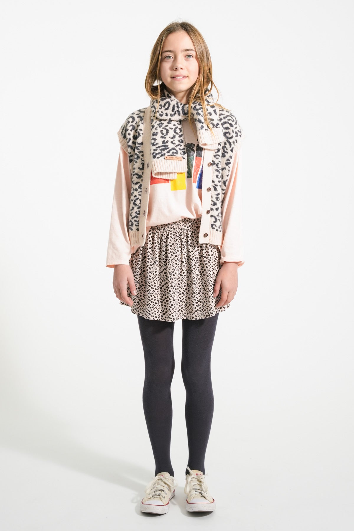 Short pale pink skirt with animal print
