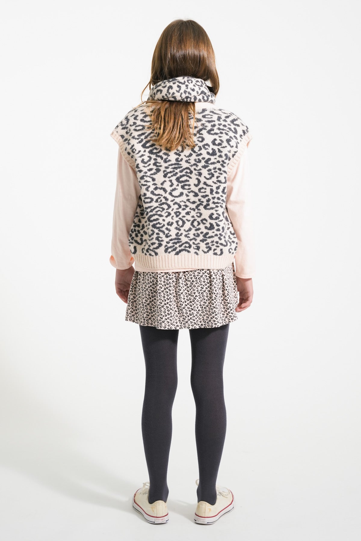 Short pale pink skirt with animal print