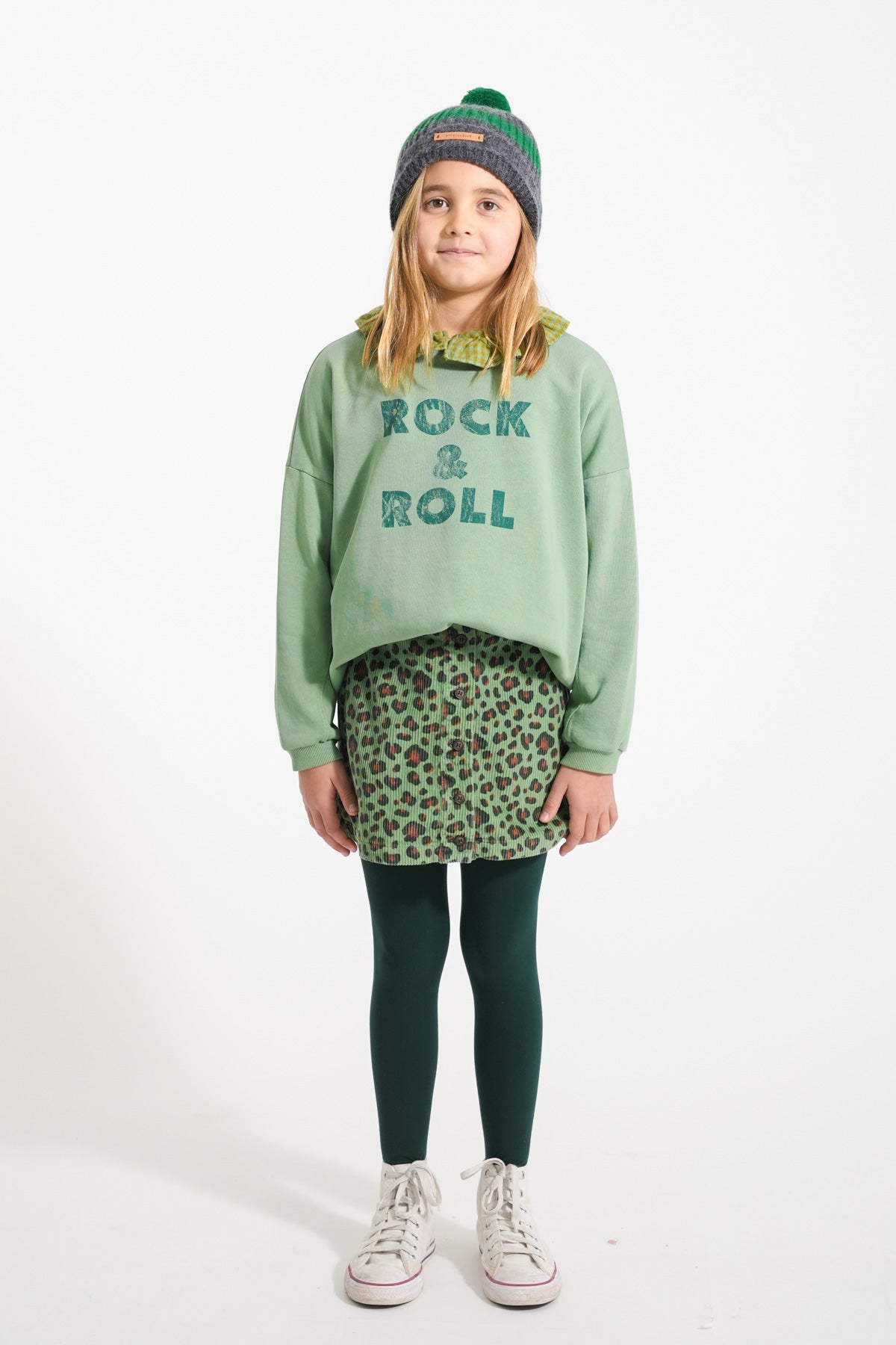 Green sweatshirt with "rock & roll" print