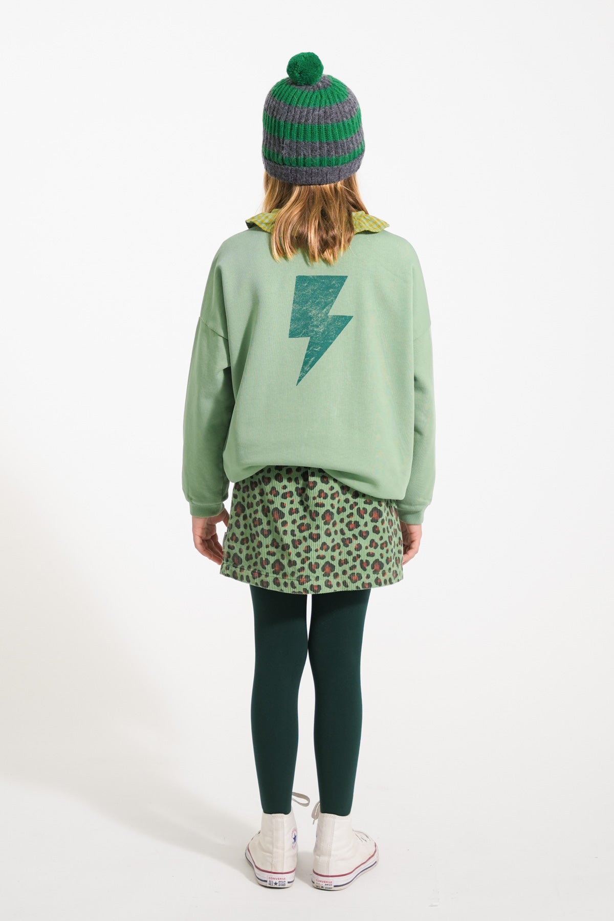 Green sweatshirt with "rock & roll" print