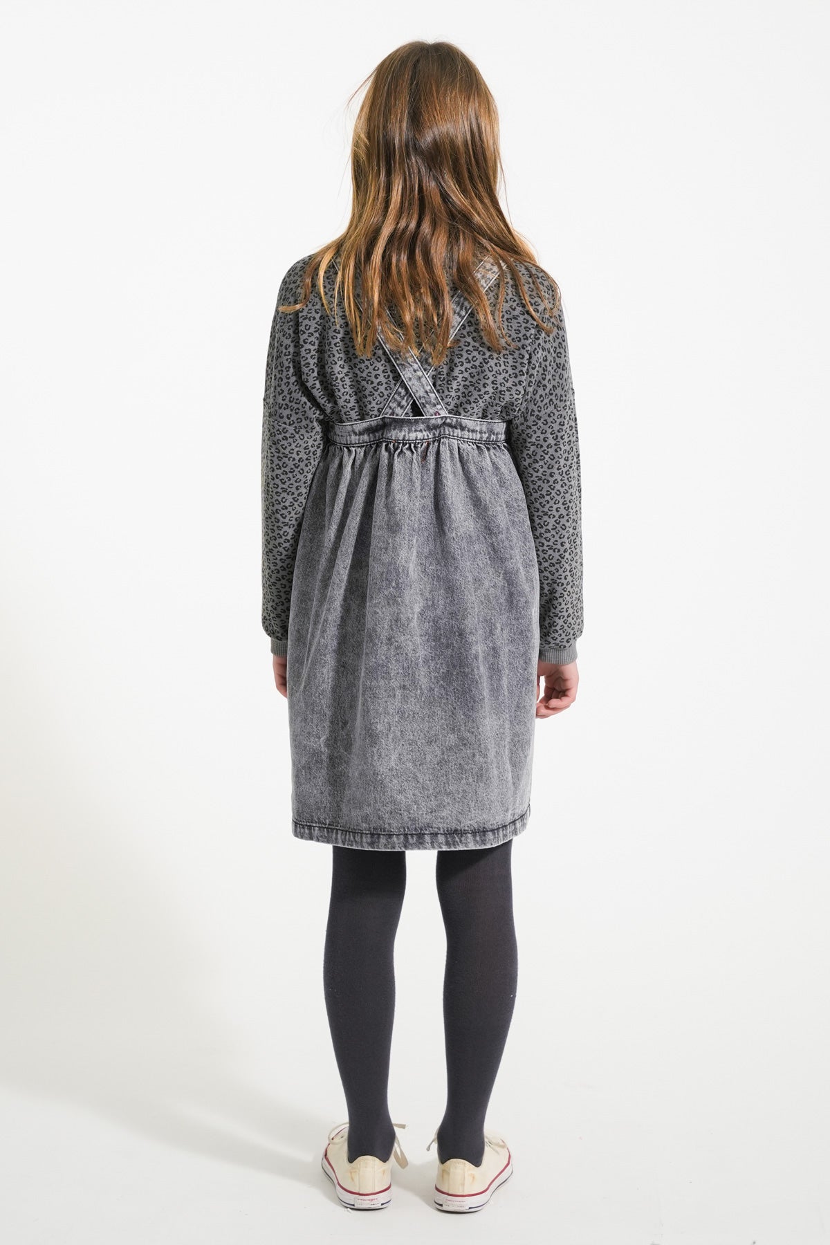 Short dress with washed -down black denim suspenders